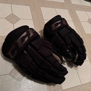 CCM U + 12 All Black Mens Hockey Gloves
